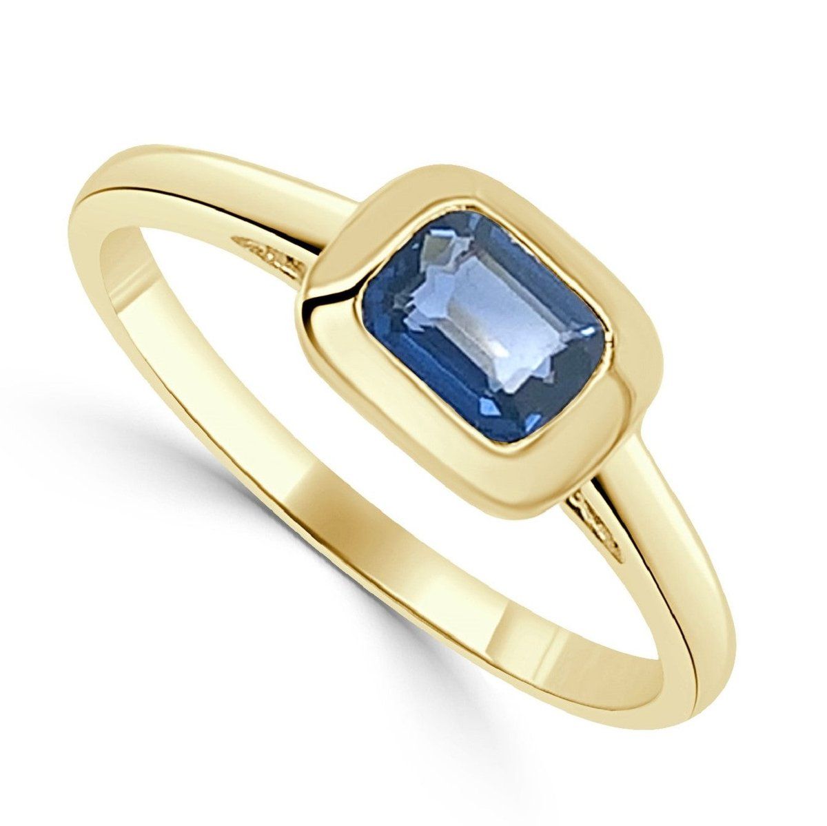 Image of a blue sapphire ring set in a gold band