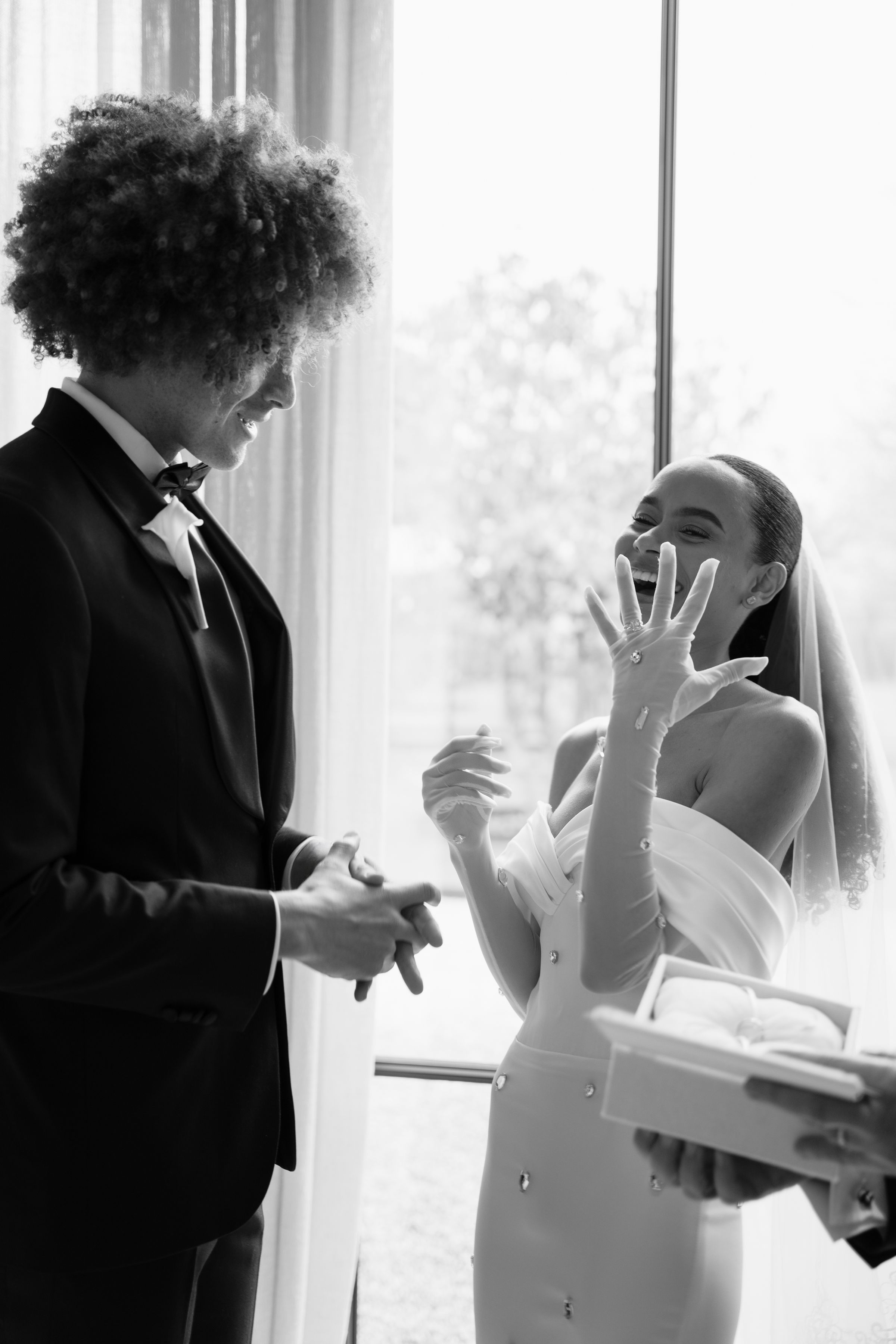 Image of bride and groom laughing