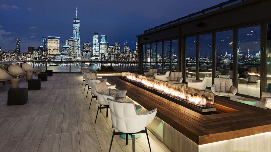 Rooftop bar with view of NYC skyline