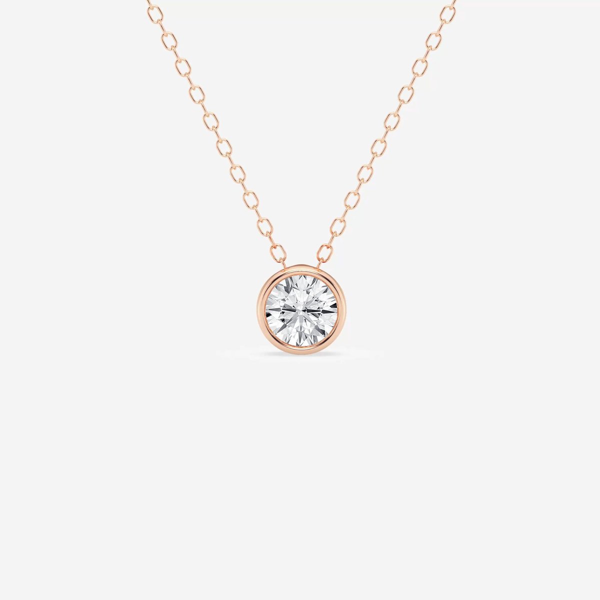 Image of gold round bezel set diamond pendant necklace