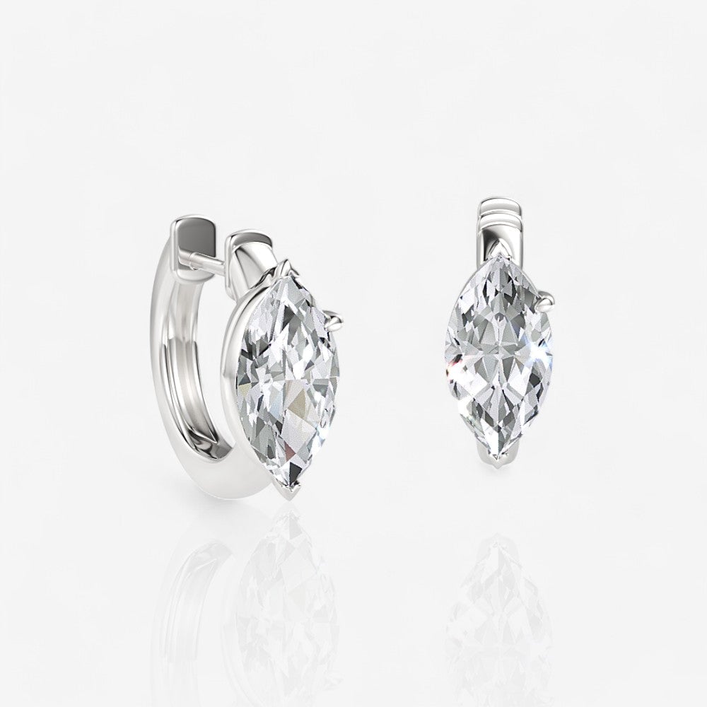 Image of marquise shaped diamond huggie earrings set in platinum 