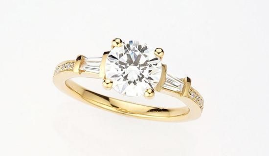 yellow gold round-cut engagement ring