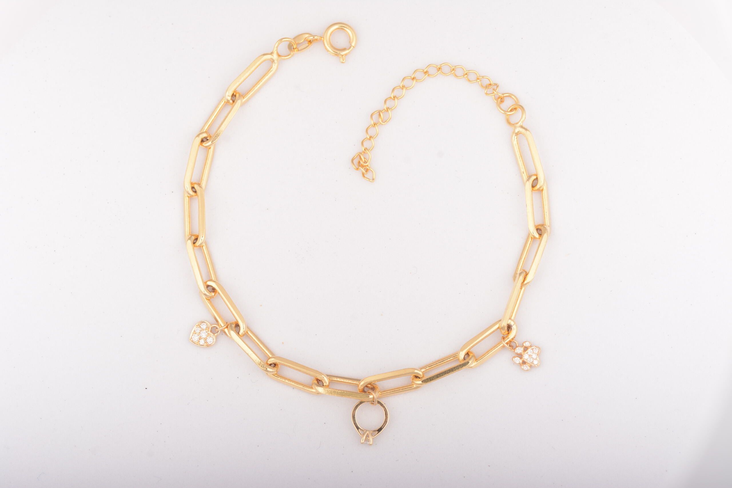 Image of a yellow gold charm bracelet
