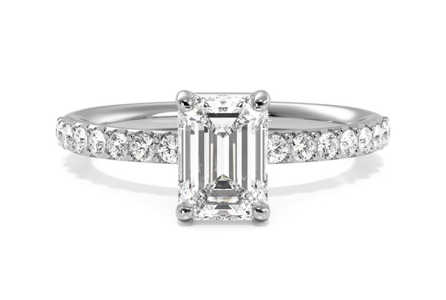 emerald cut diamond in sidestone setting