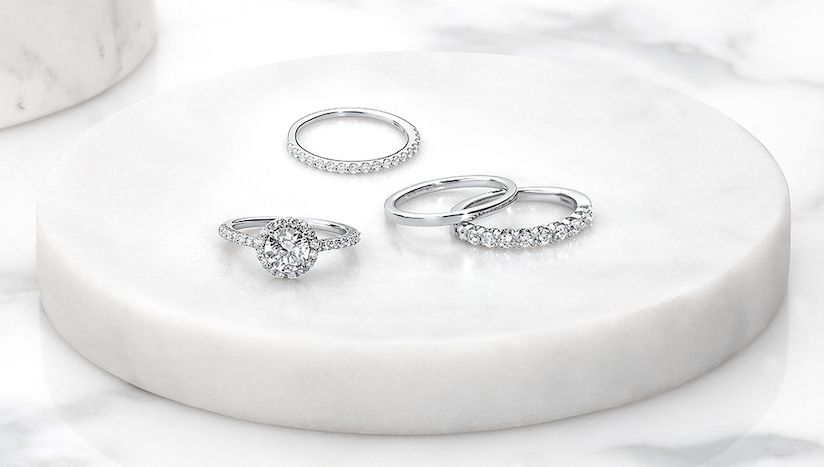 halo engagement ring with wedding rings