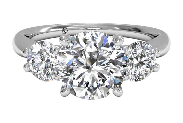round-cut diamond three-stone engagement ring