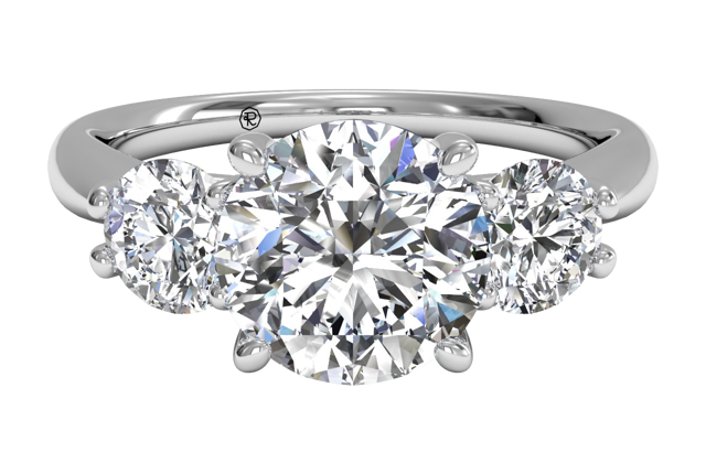 round-cut three-stone diamond engagement ring