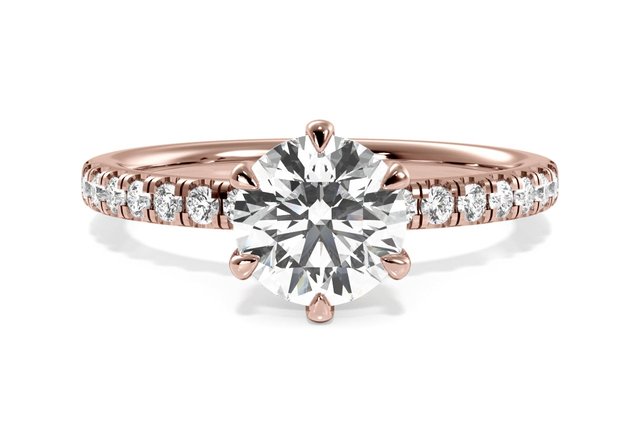 six-prong claw engagement ring in rose gold